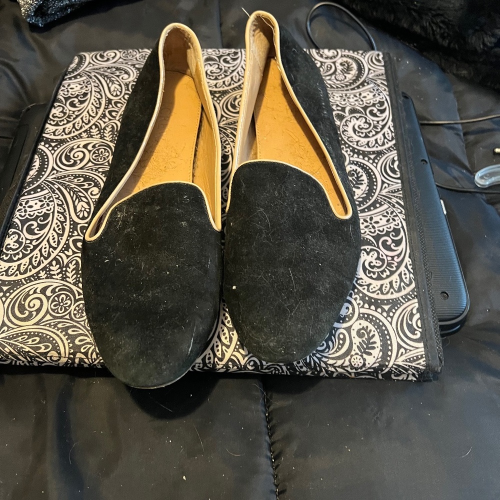 Black leather flats